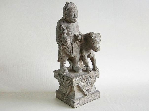 Stone architectural ornament of a man with a dog – (3911)